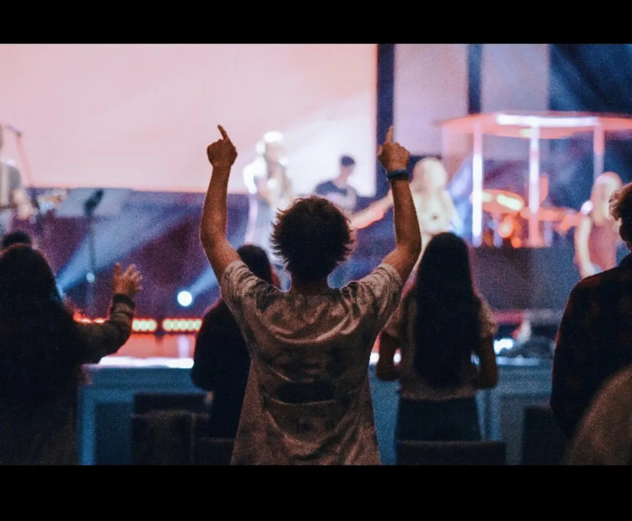People praising at First Baptist Church Indian Trail.