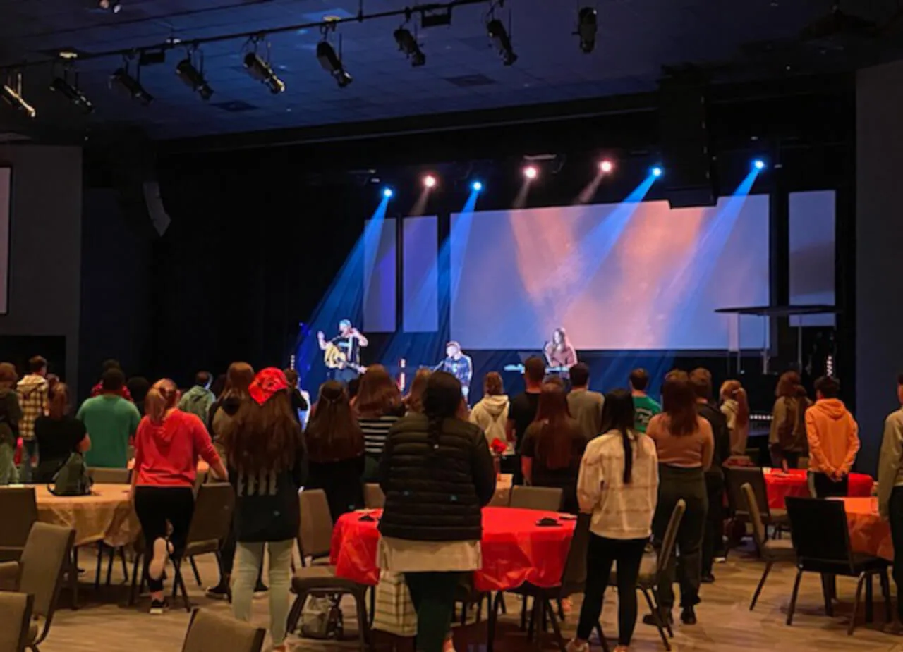 Community are praising inside the hall at First Baptist Church Indian Trail.