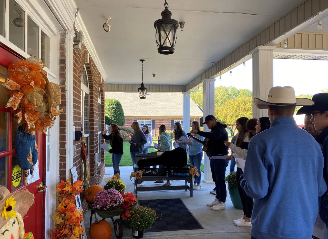 Community praising outside the house at First Baptist Church Indian Trail.