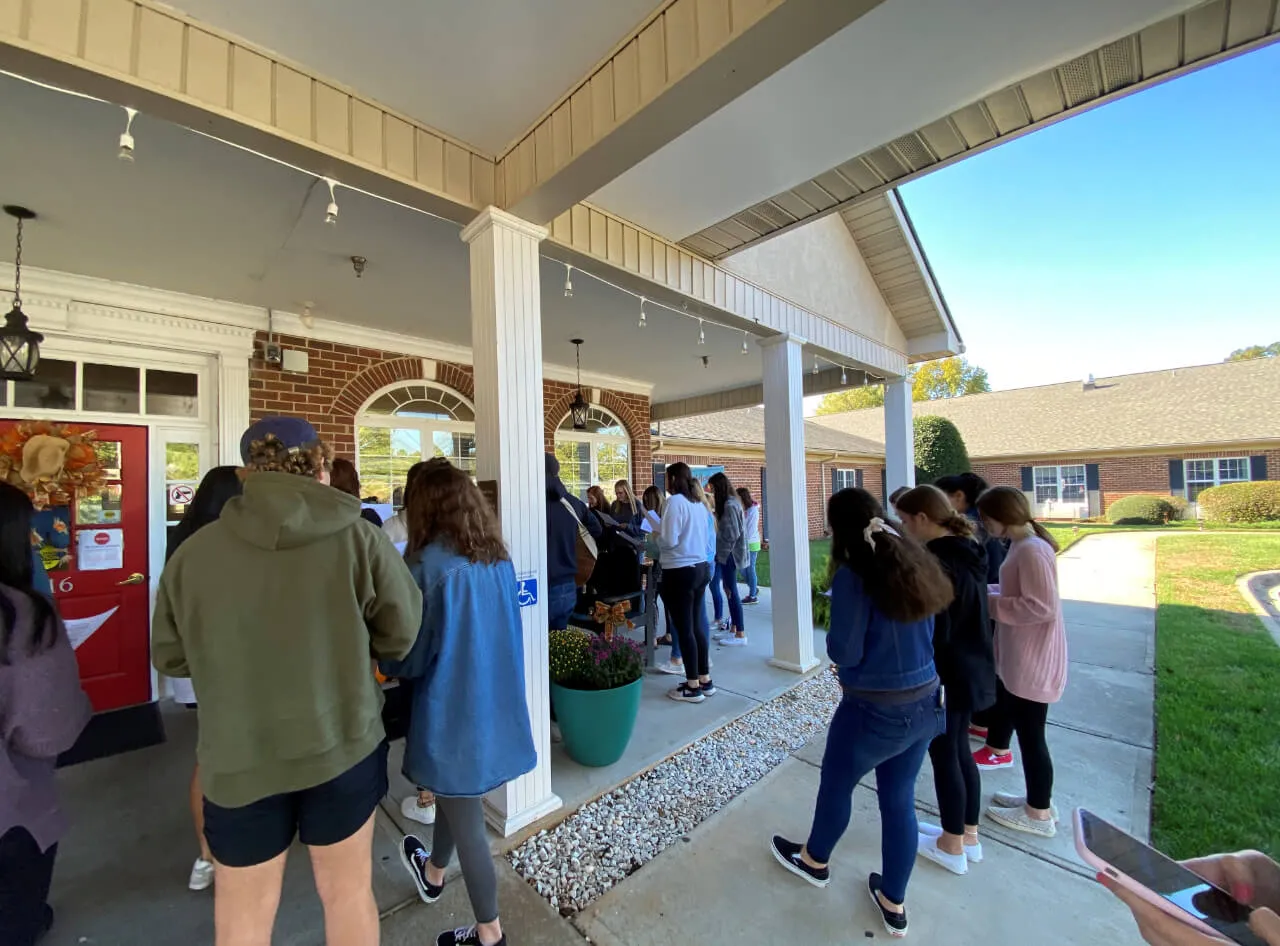 People outside the house at First Baptist Church Indian Trail.