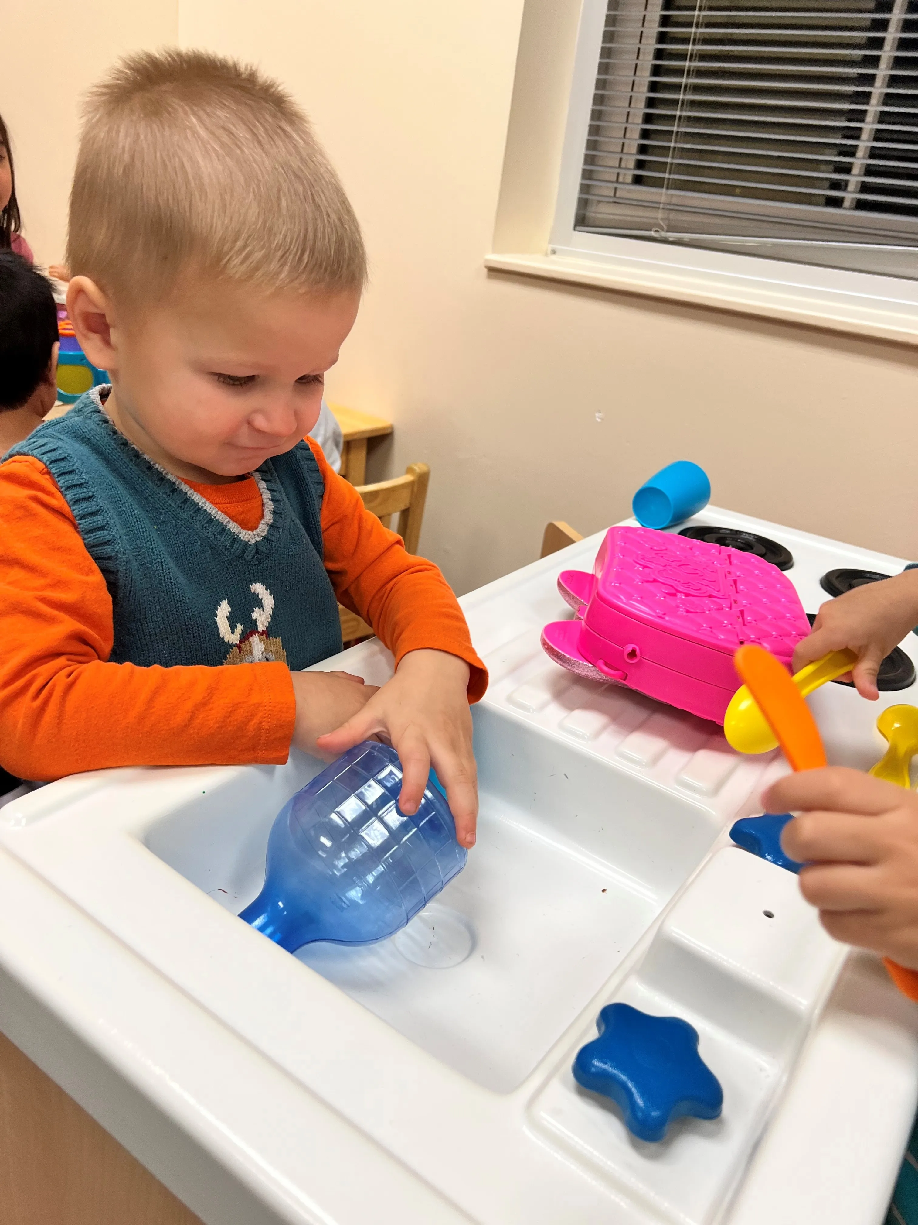 little boy playing at First Baptist Church- Indian Trail