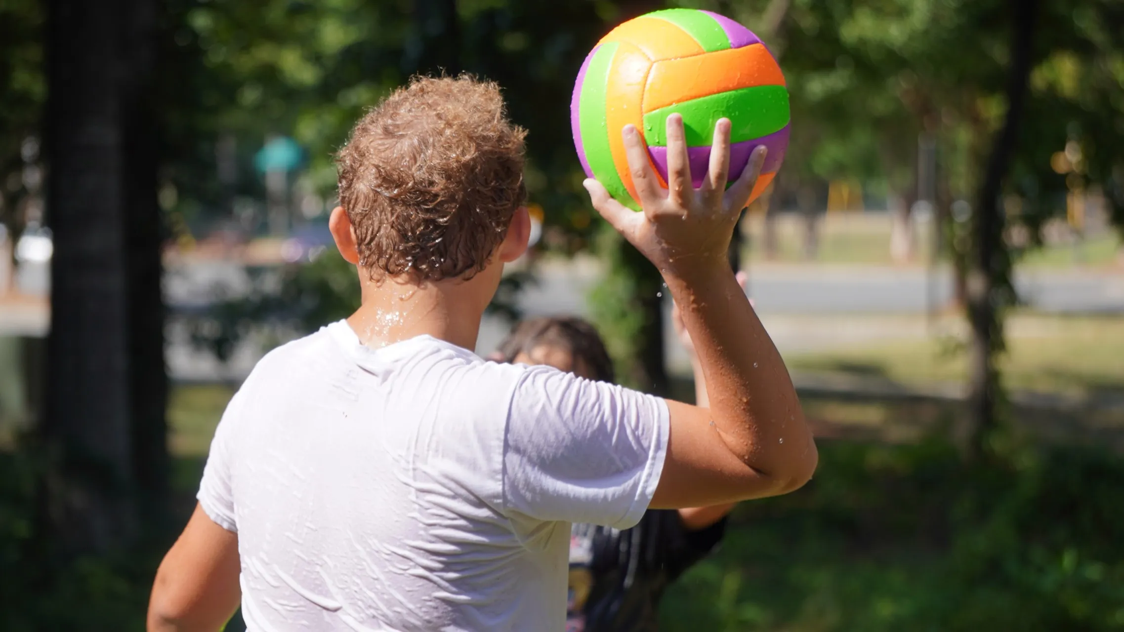 A boy playing a volleyball at First Baptist Church Indian Trail.
