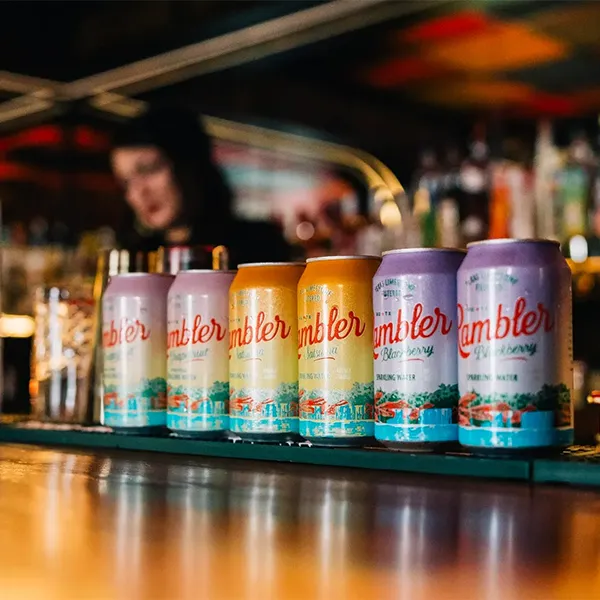 Rambler Sparkling Water flavors lineup on a bar top.