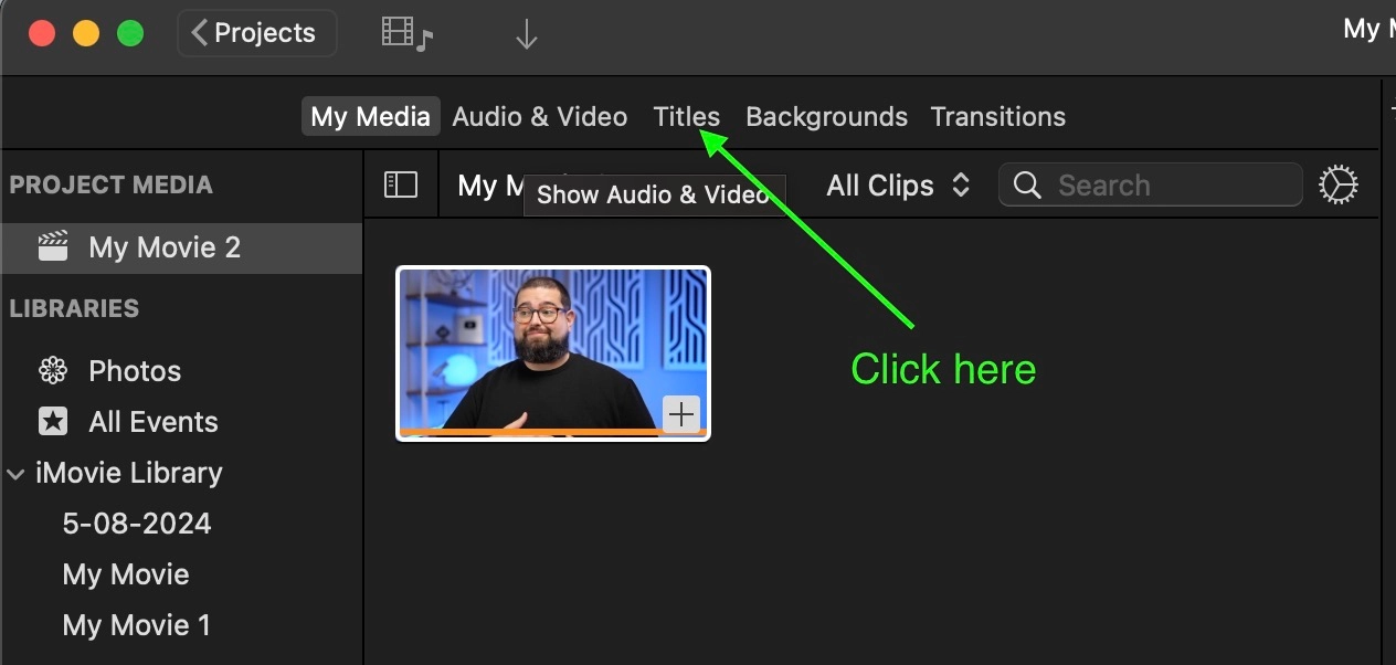 click the titles button in imovie