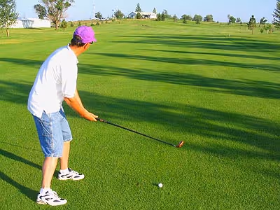 Person playing golf at mott golf course