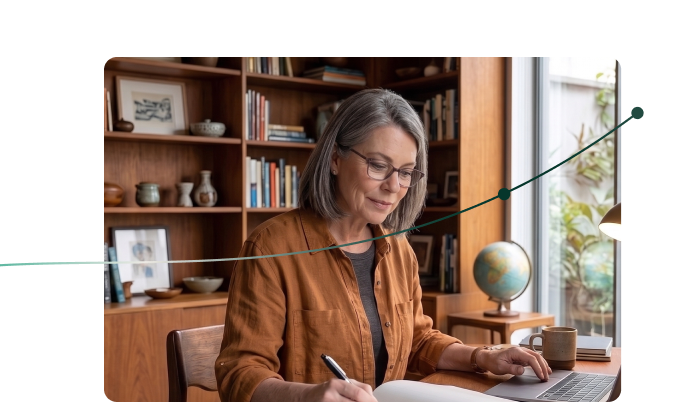 Maria writing at her desk at home during post-menopause