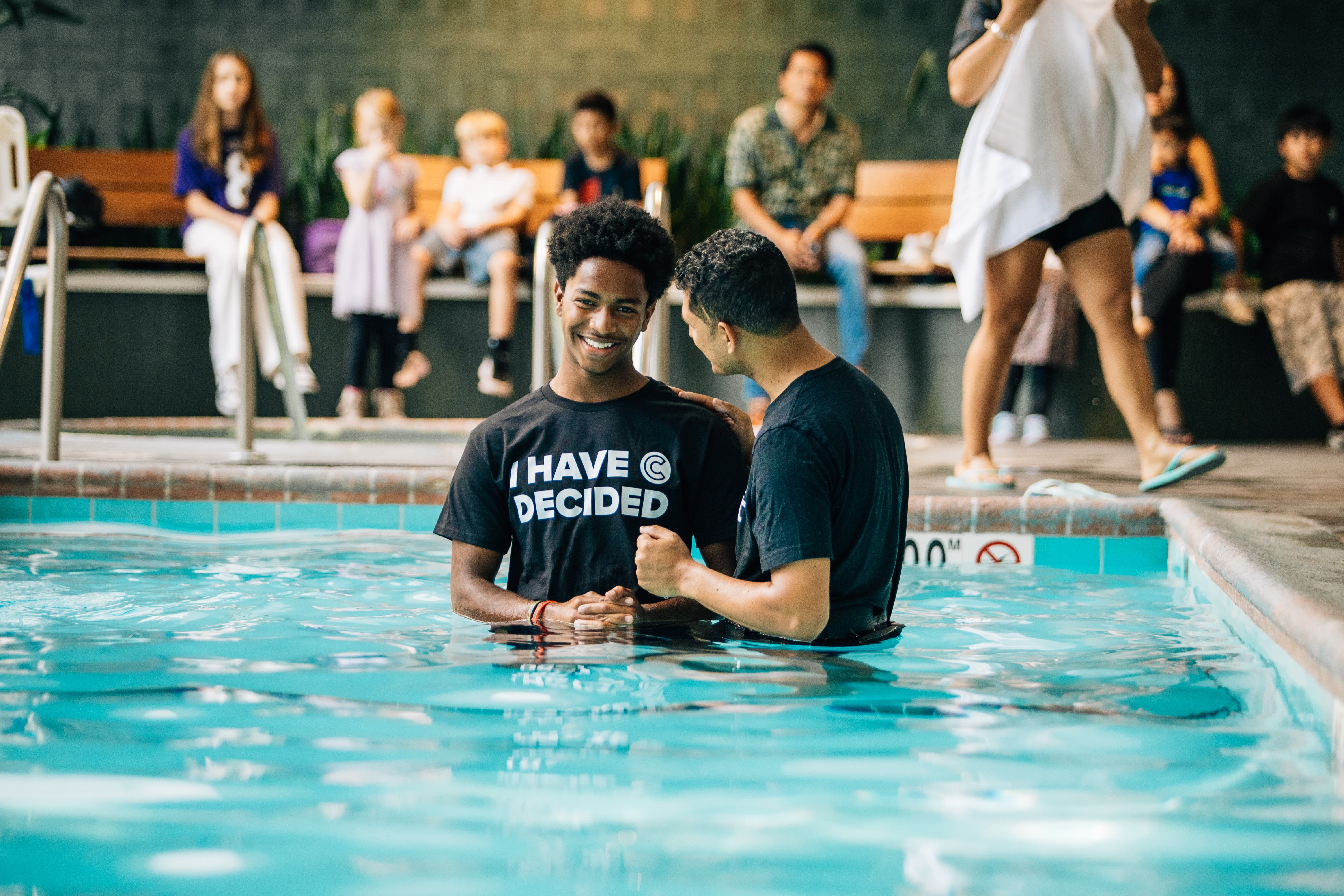 Two women Holding Sign Of Community Group