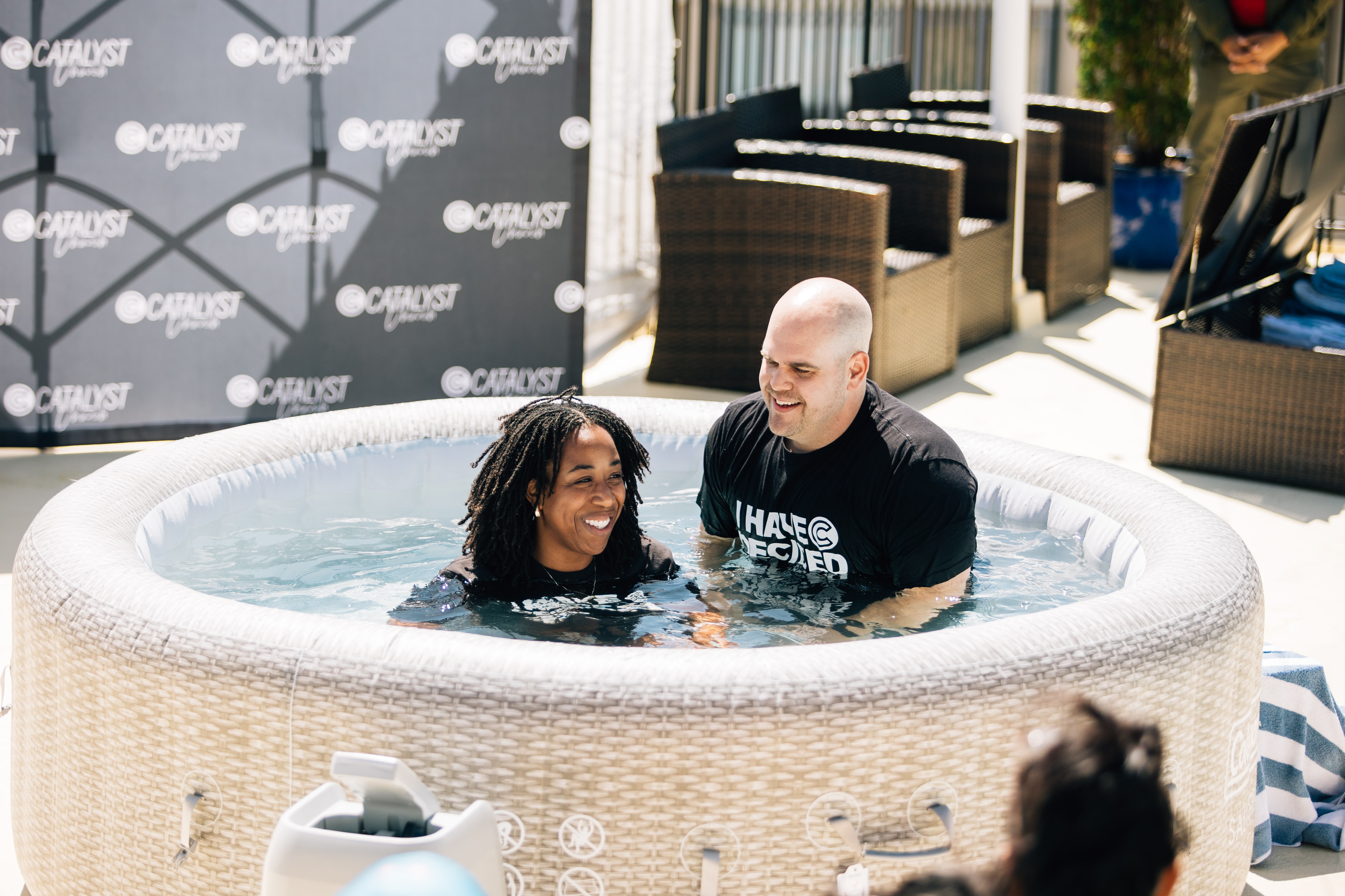 Two women Holding Sign Of Community Group