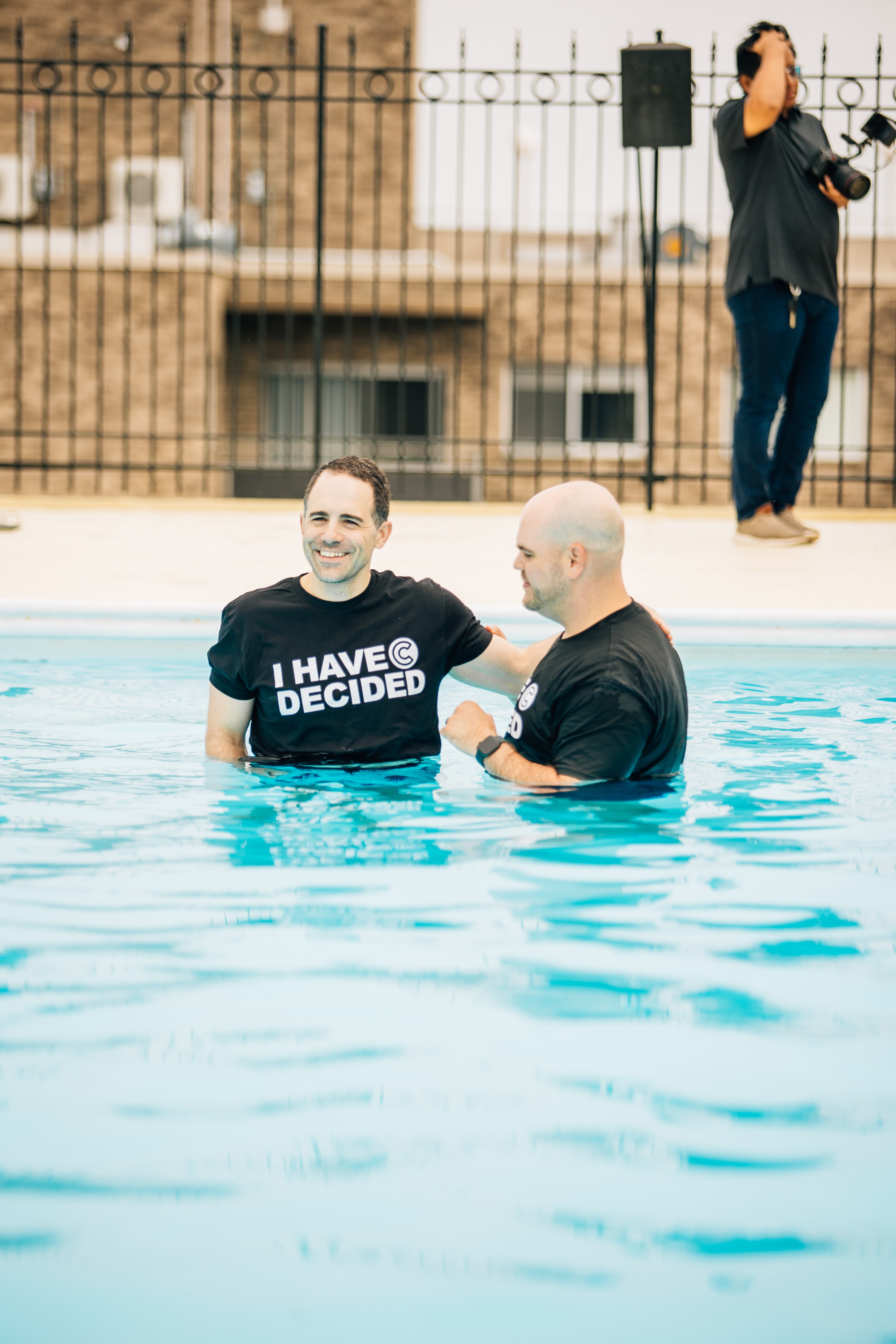 Two women Holding Sign Of Community Group