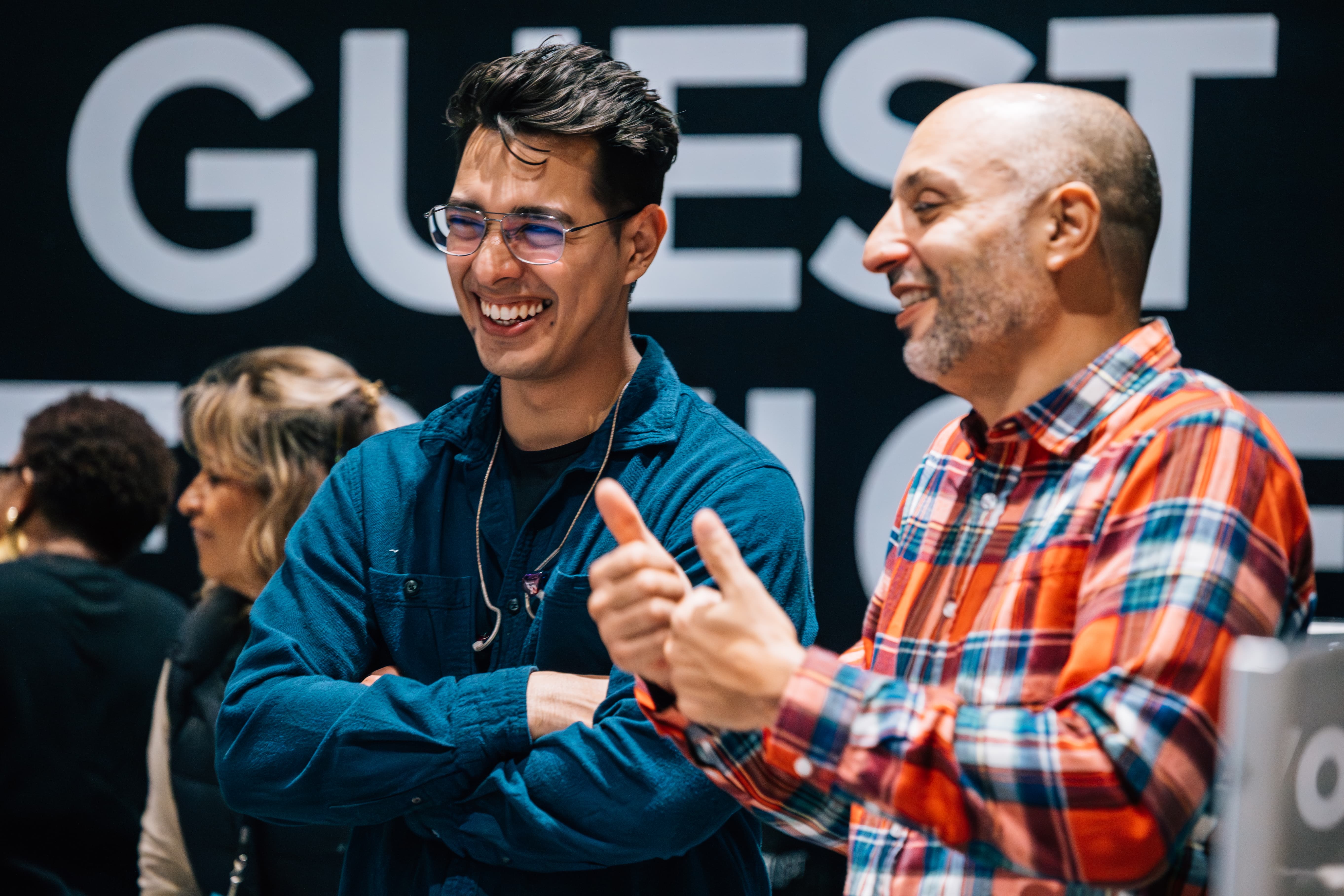 Two women Holding Sign Of Community Group