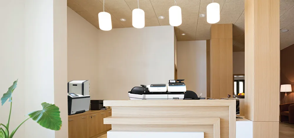 fp postage meter on lobby counter