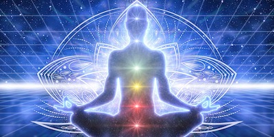 chakra energy centers colored light seated in meditation pose