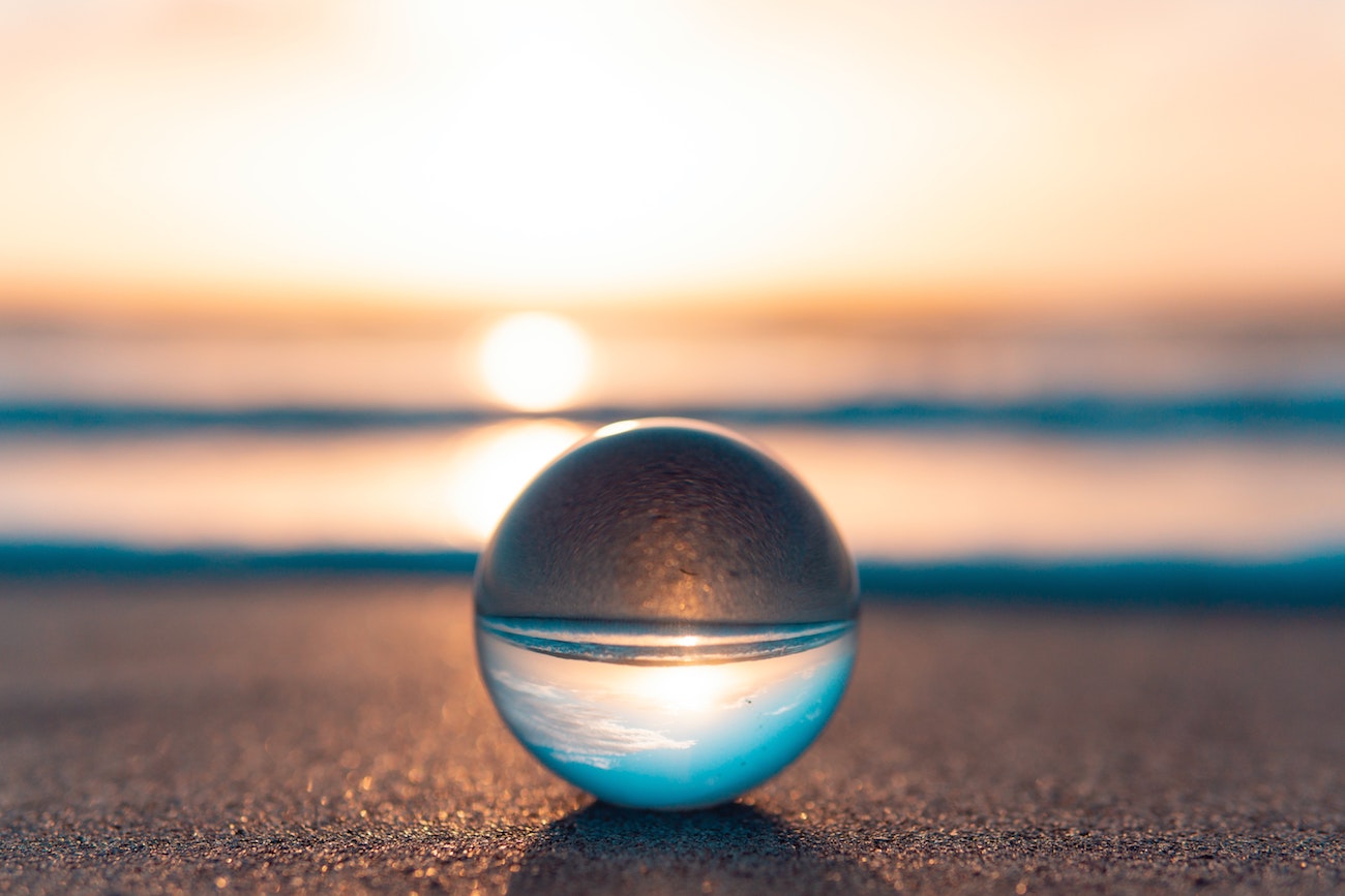 orb reflecting beach at sunset