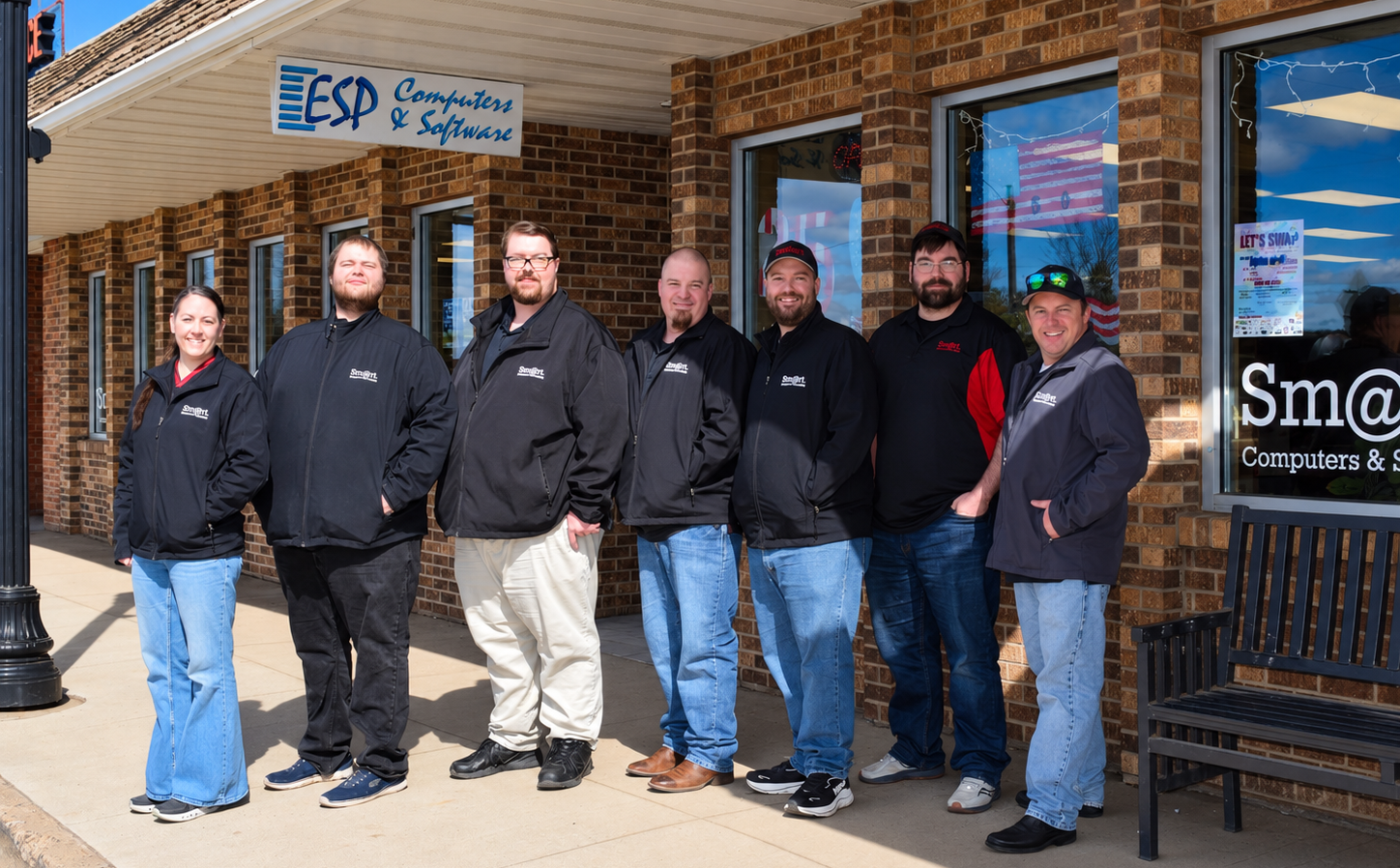 The Smart Computers & Consulting team outside their storefront in Dickinson, North Dakota