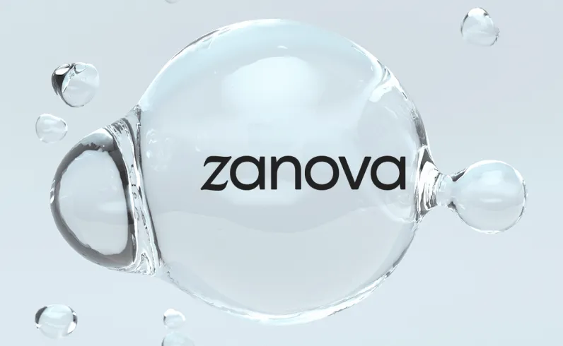 Transparent water bubble with smaller bubbles surrounding it and the word 'zanova' inside the largest bubble on a light blue background.