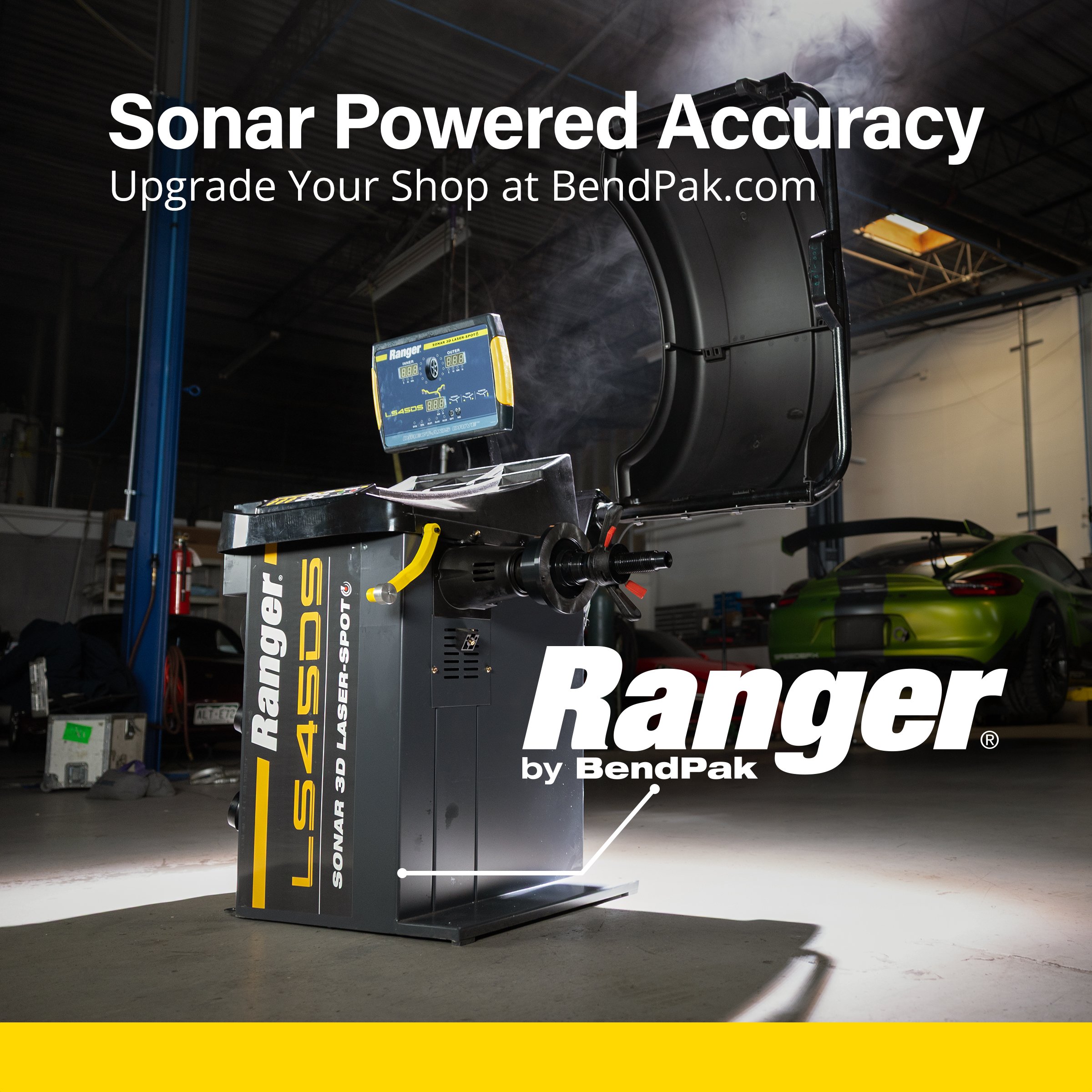 Ranger LS45DS wheel balancer in a shop – "Sonar Powered Accuracy" ad