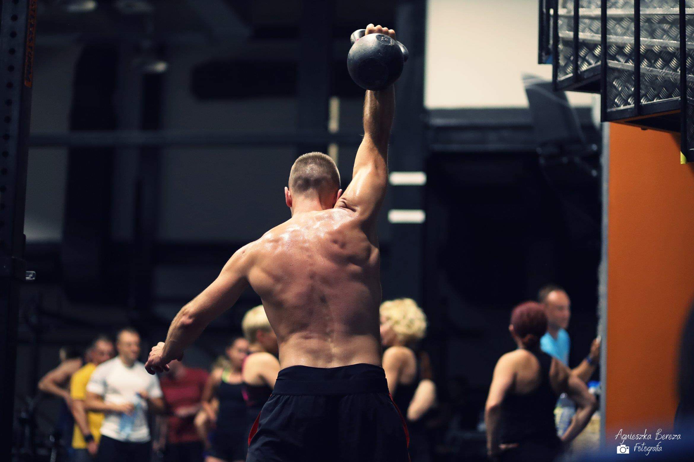 Professor Cross holding Kettlebell