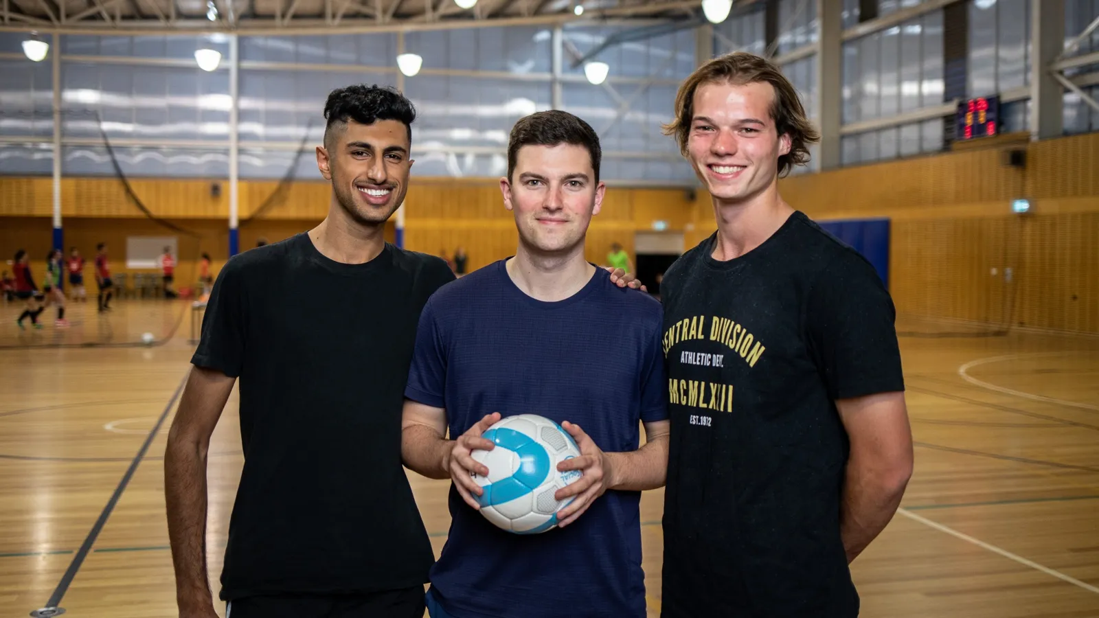 Three male social Futsal players