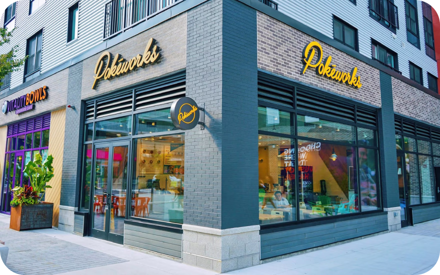 Pokeworks fast-casual poke restaurant exterior showing branding and main entrance.
