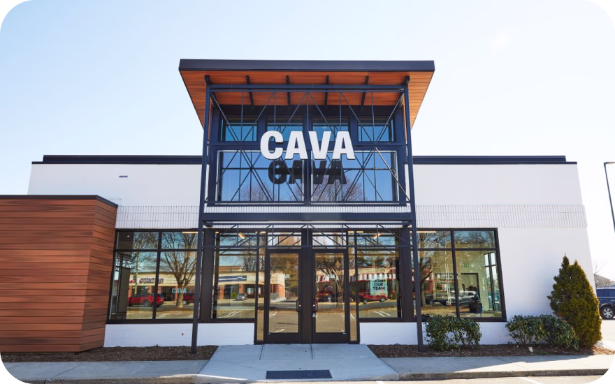 CAVA Mediterranean fast-casual restaurant exterior with logo and entrance.