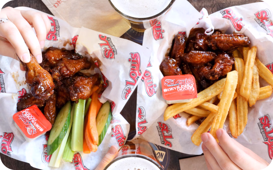 St. Louis Bar & Grill plate of wings served with signature garlic dill sauce.