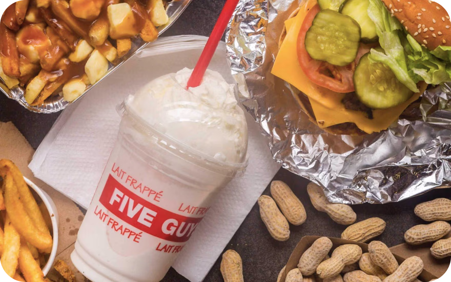 Five Guys Canada burger with fresh toppings and a side of hand-cut fries