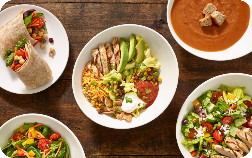 Chopped Leaf bowl with fresh greens, vegetables, grains, and protein options.