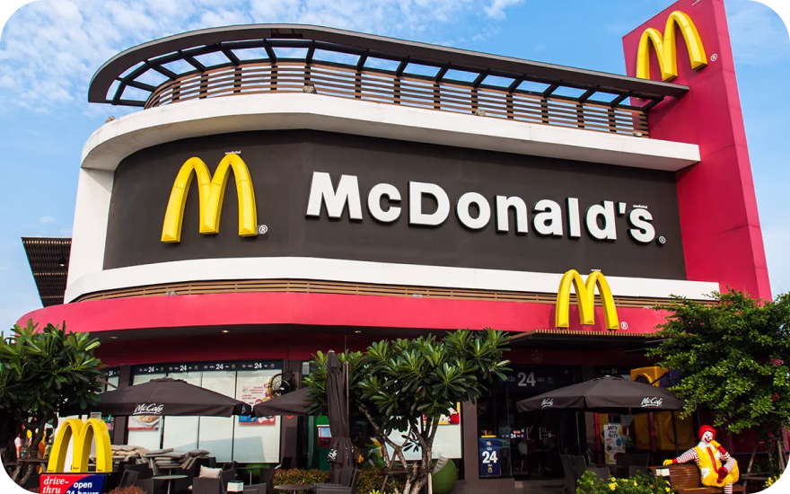 McDonald’s restaurant exterior with front seating and drive-thru signage, one of the top restaurants in the US