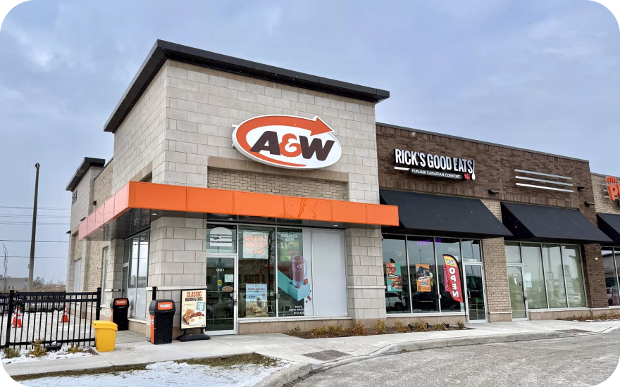 A&W restaurant exterior featuring retro-inspired branding and signage from a historic US franchise.