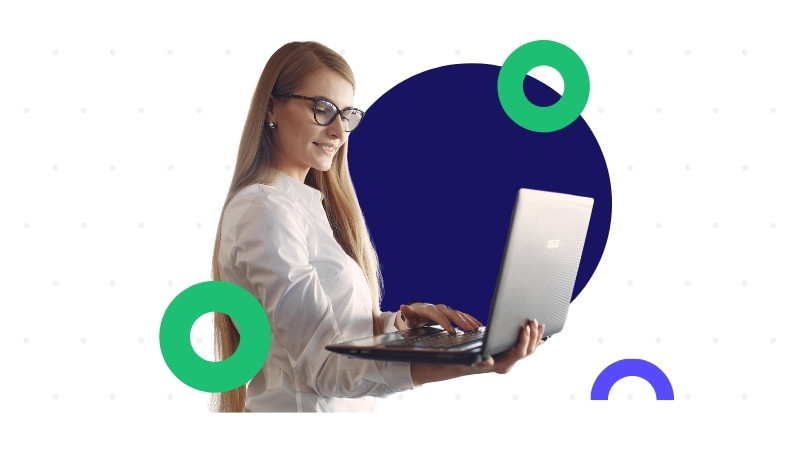 A restaurant working is leveraging restaurant technology on her laptop.