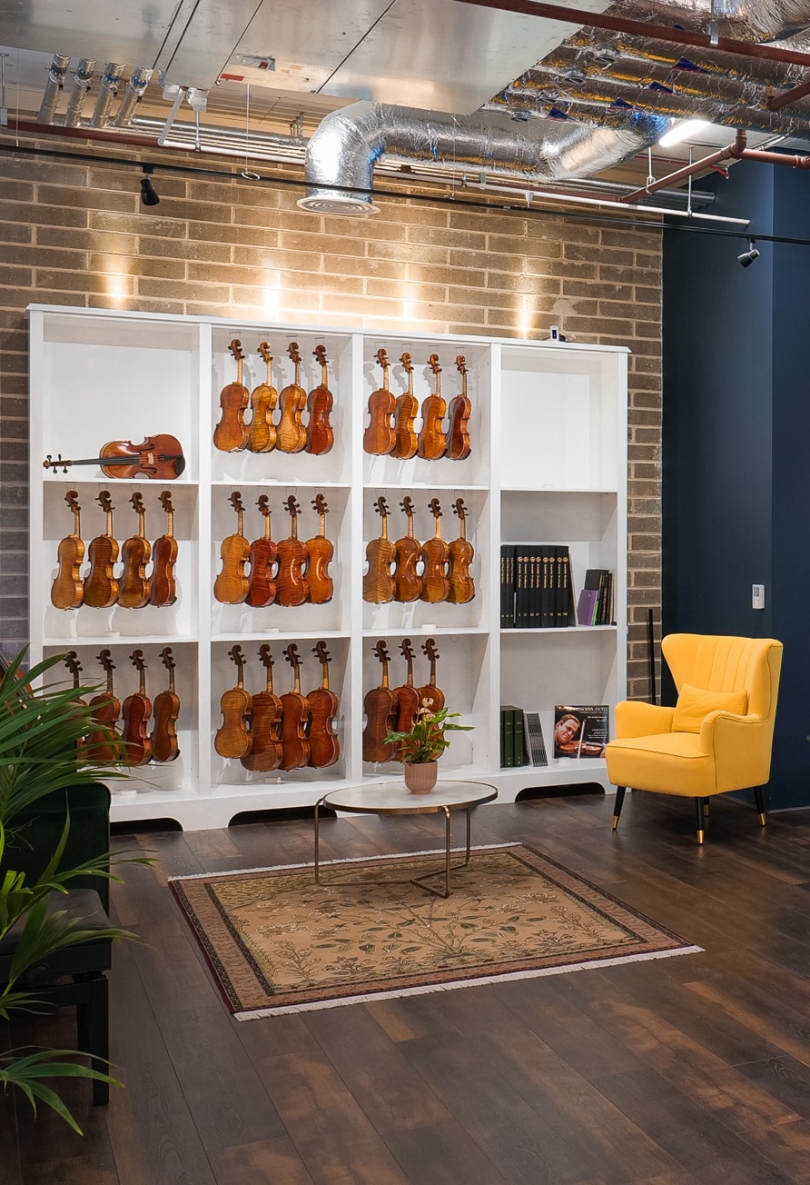 violin cabinet of the myluthier london showroom