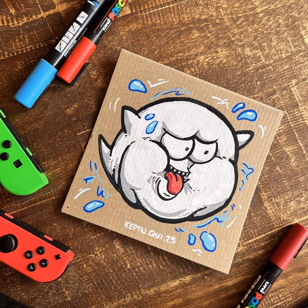 Ein Kunstwerk von Julian Reichel auf recyceltem Pizzakarton es zeigt dicken Boo Geist