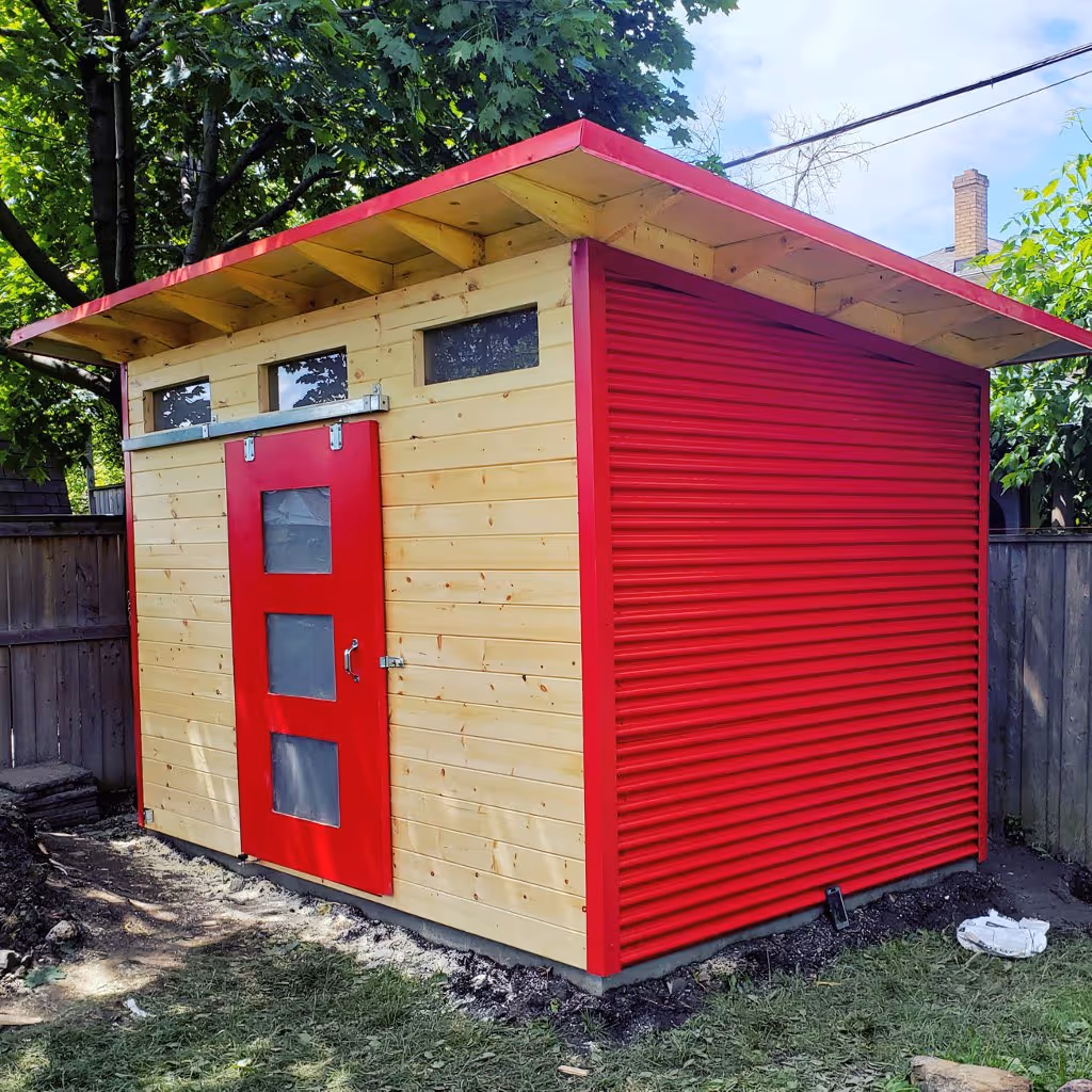 Colourful bright red shed with pine and steel siding