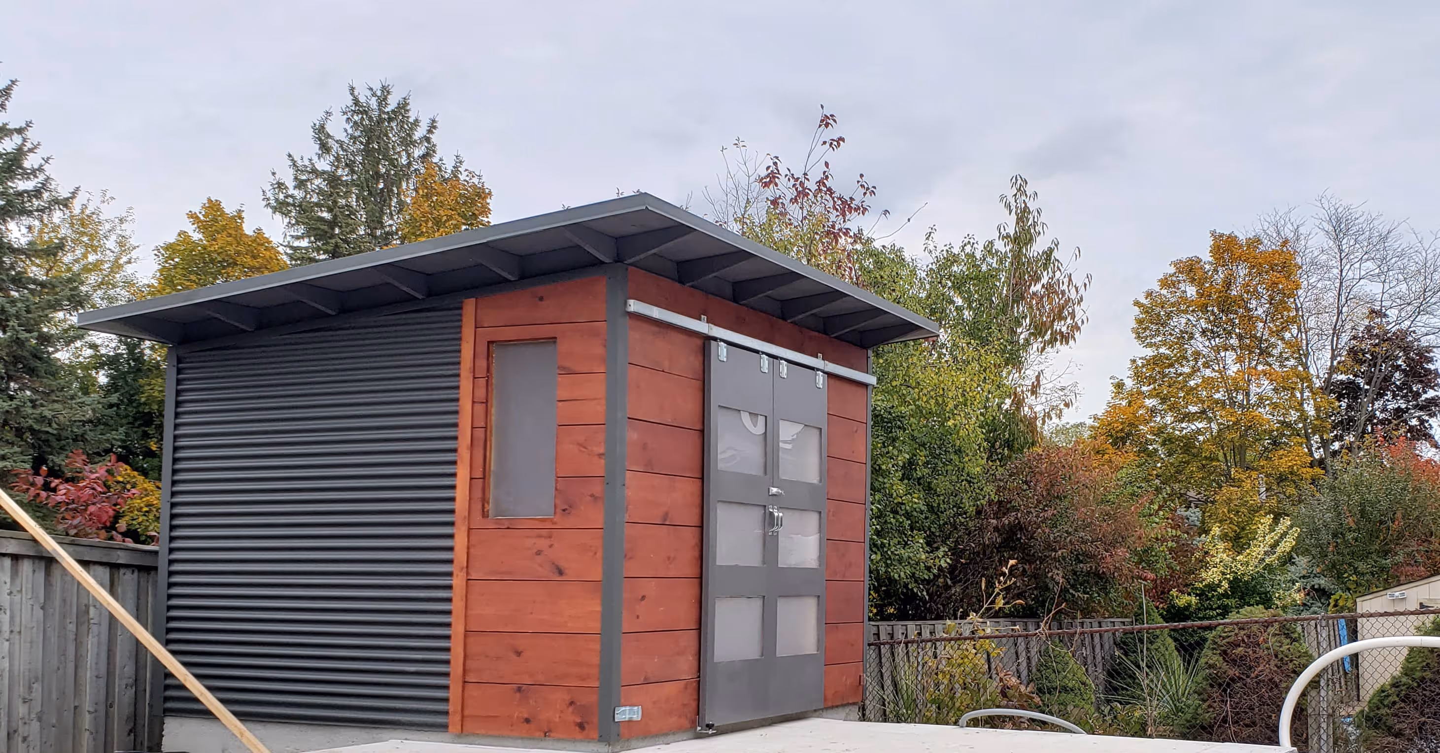 12' x 8' Custom Modern Shed with Mahogany Stain Shiplap and Charcoal Steel