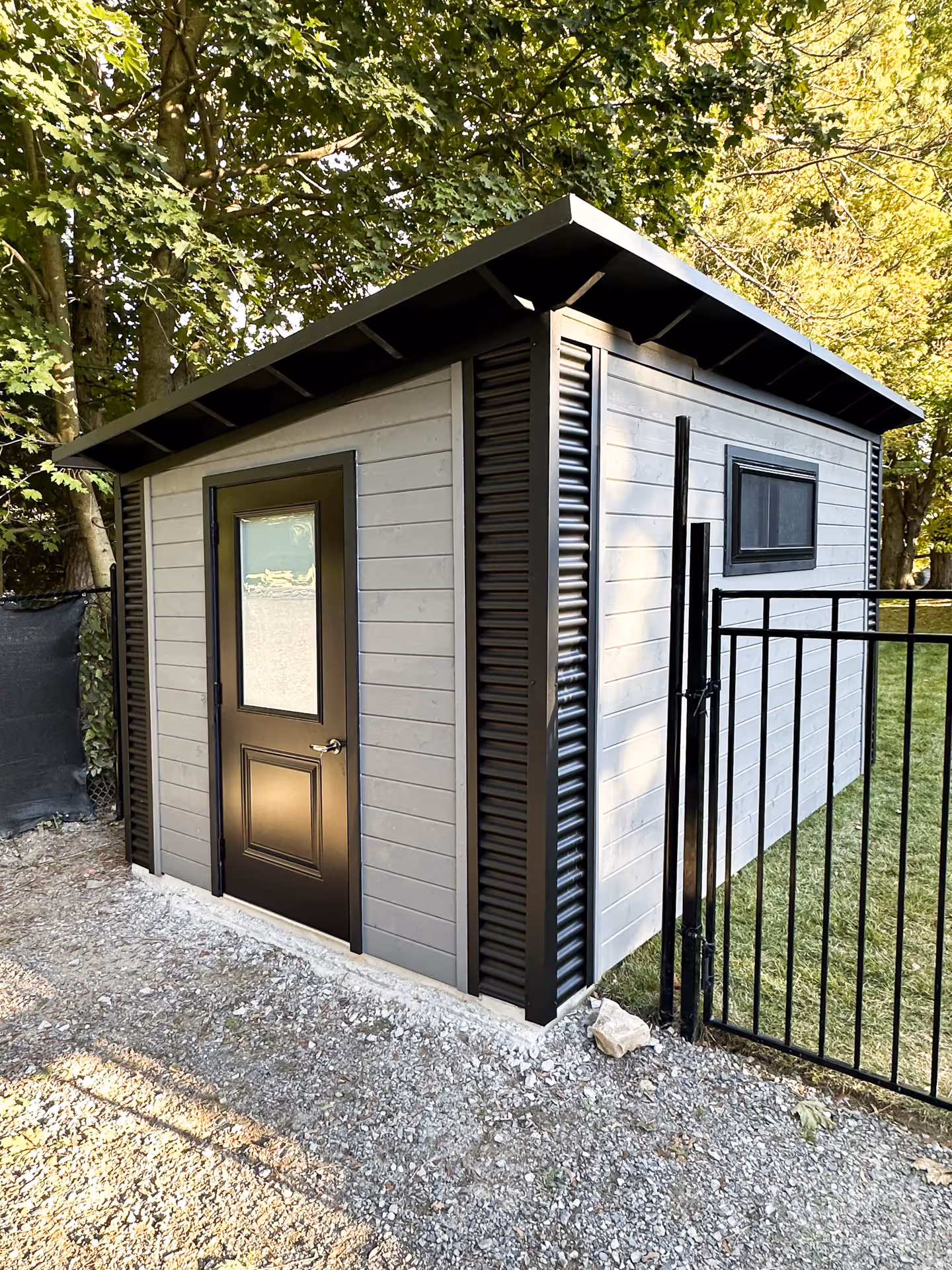 Shed with outswing door half lite