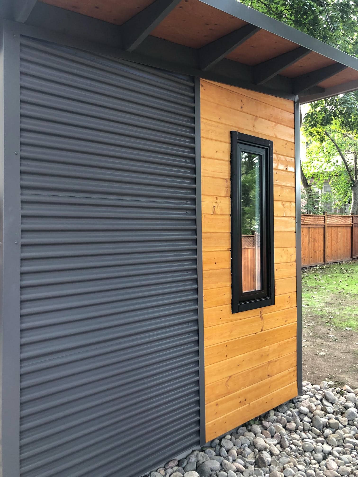 Custom Shed Side with Cedar Stained Pine and Charcoal Steel