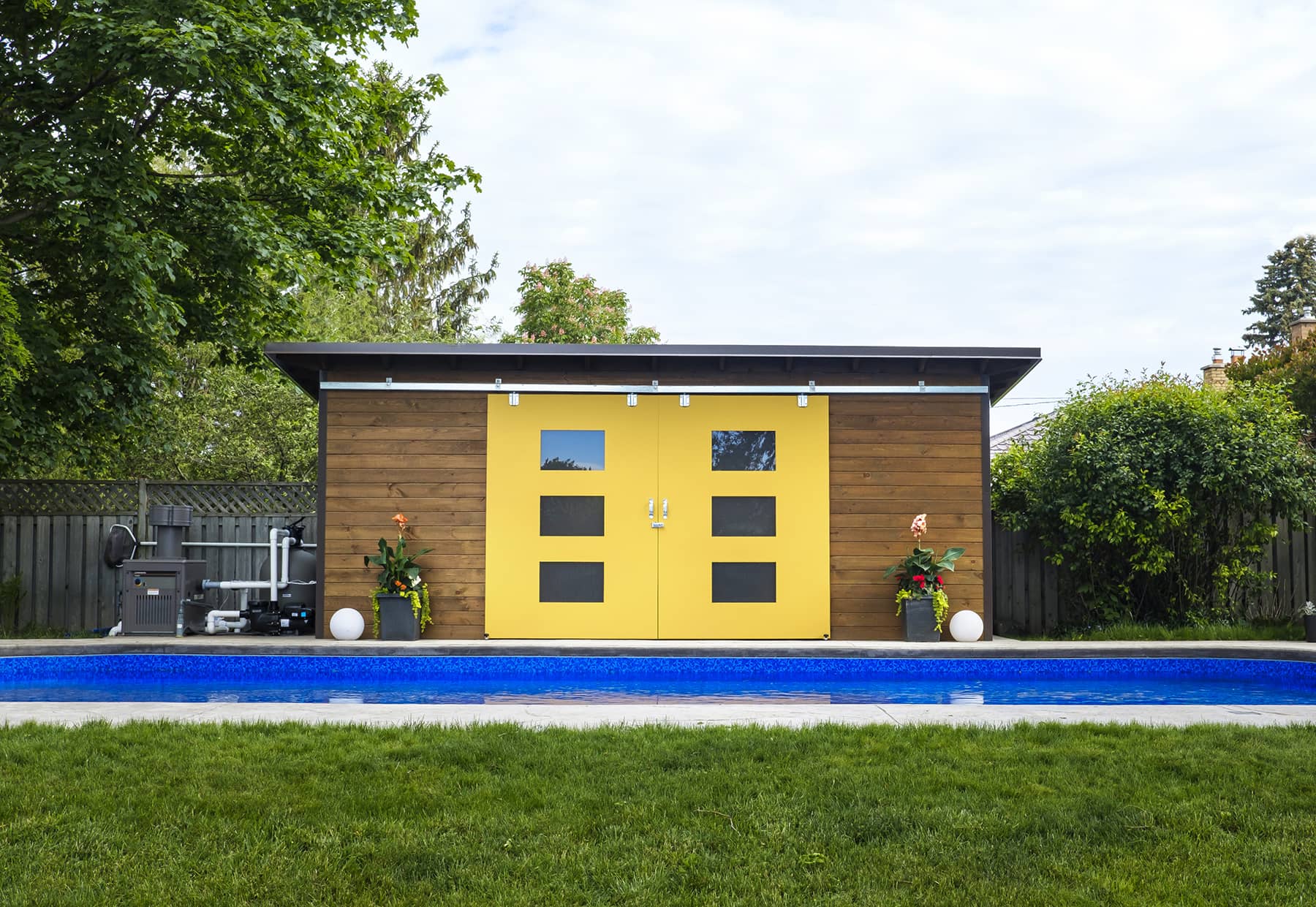 20' x 5' Essential Pool Shed with Muskoka Brown siding and Custom Painted Doors