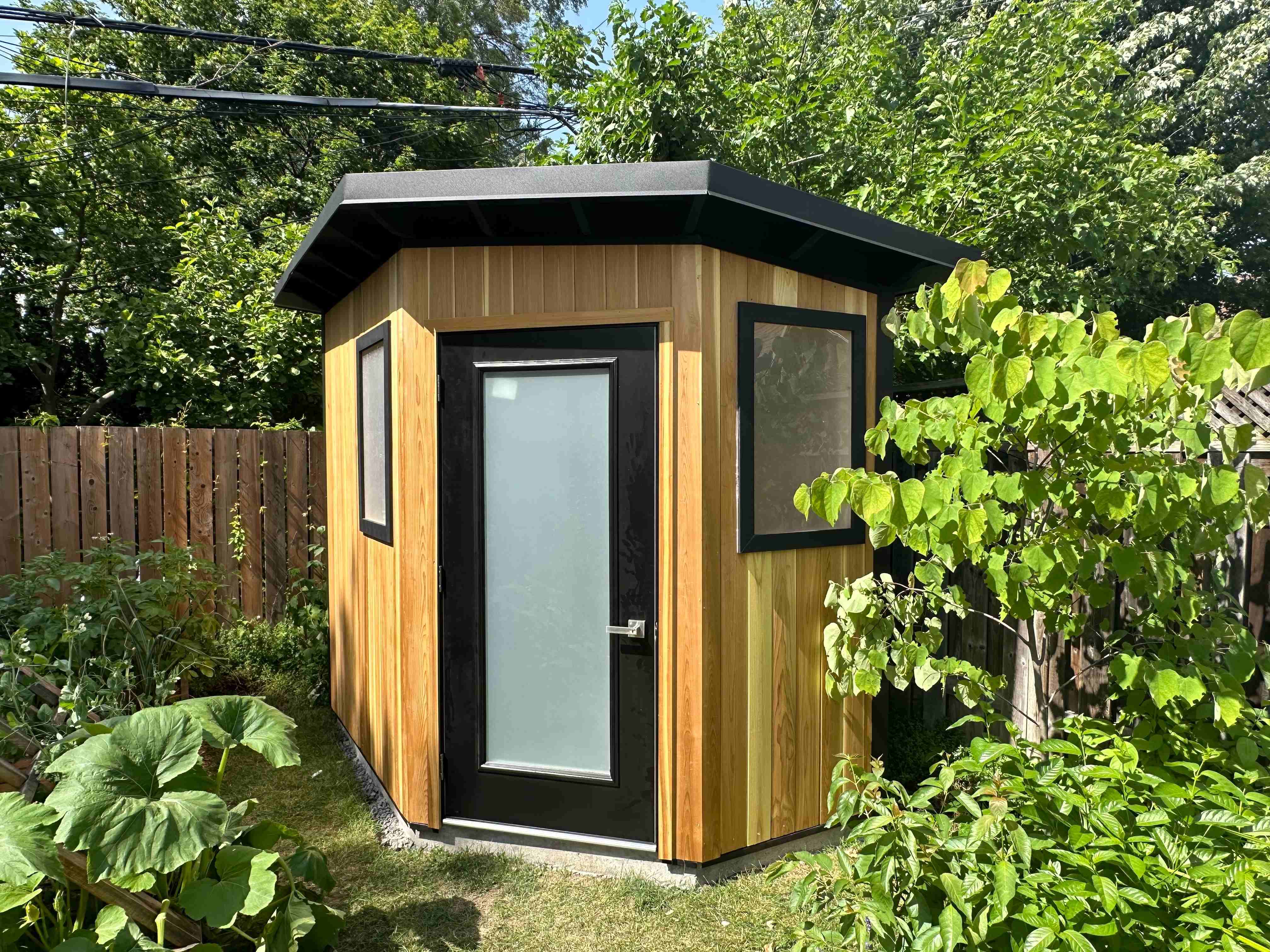8x8 Suburban Custom Modern Shed in Etobicoke with glass door and two windows