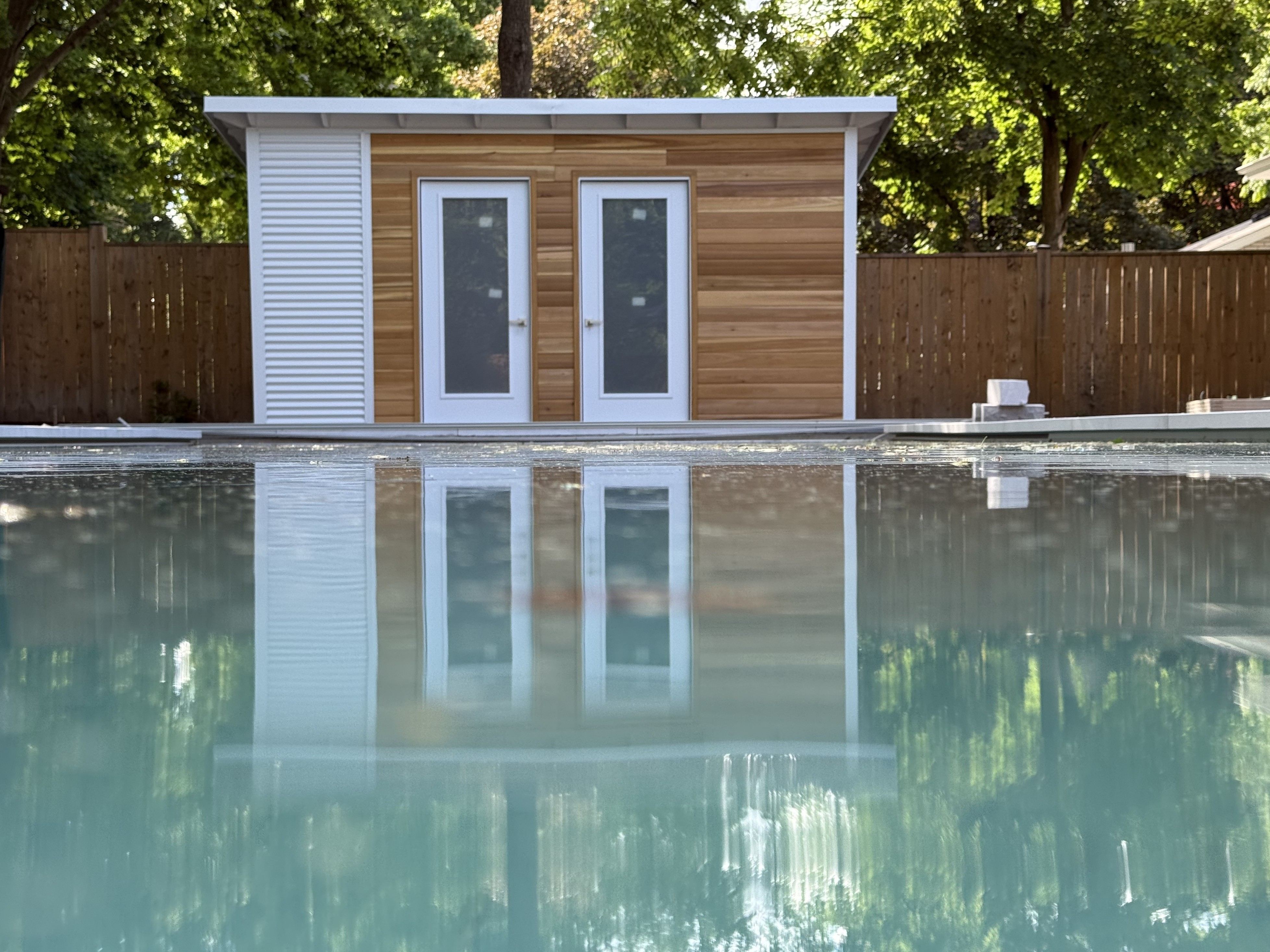 8x8 Suburban Custom Modern Shed in Etobicoke with glass door and two windows