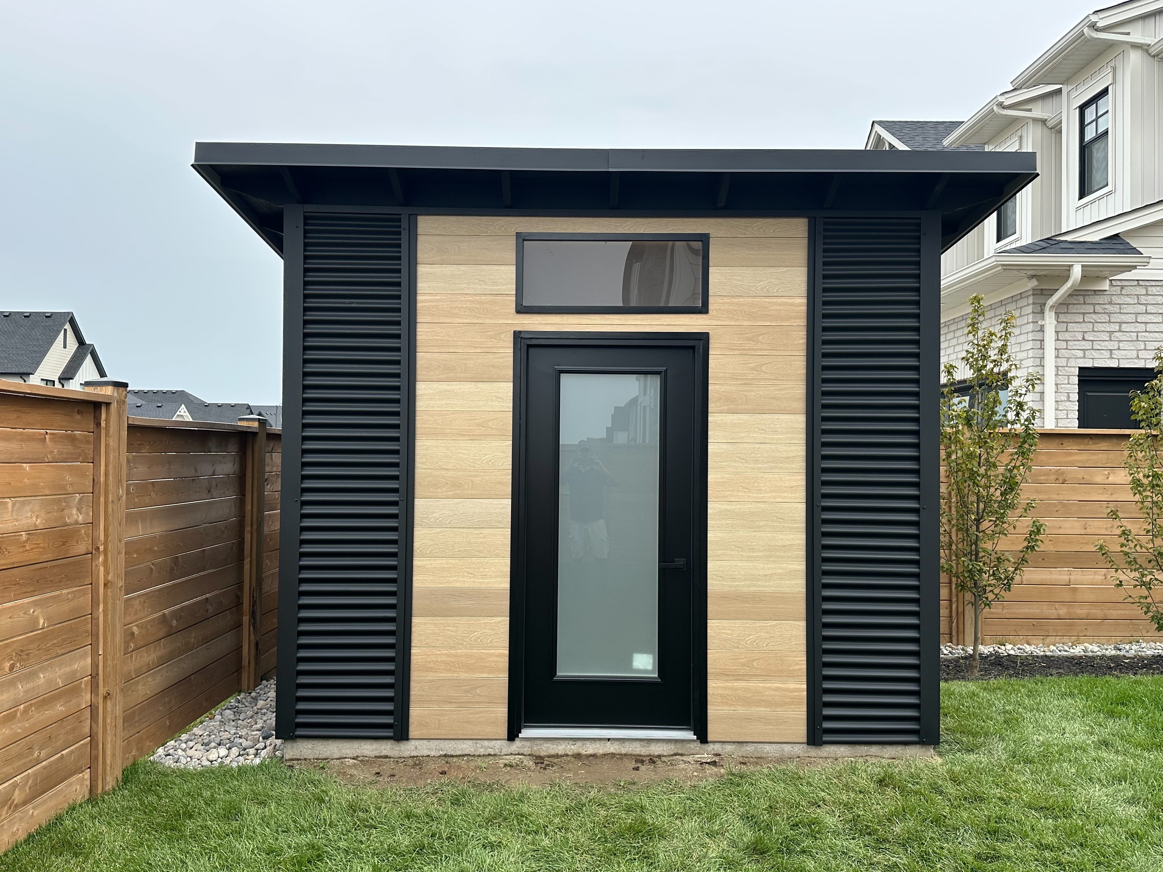 11x8 Modern Shed front entry with black glass door and frosted transom in St. Thomas Ontario