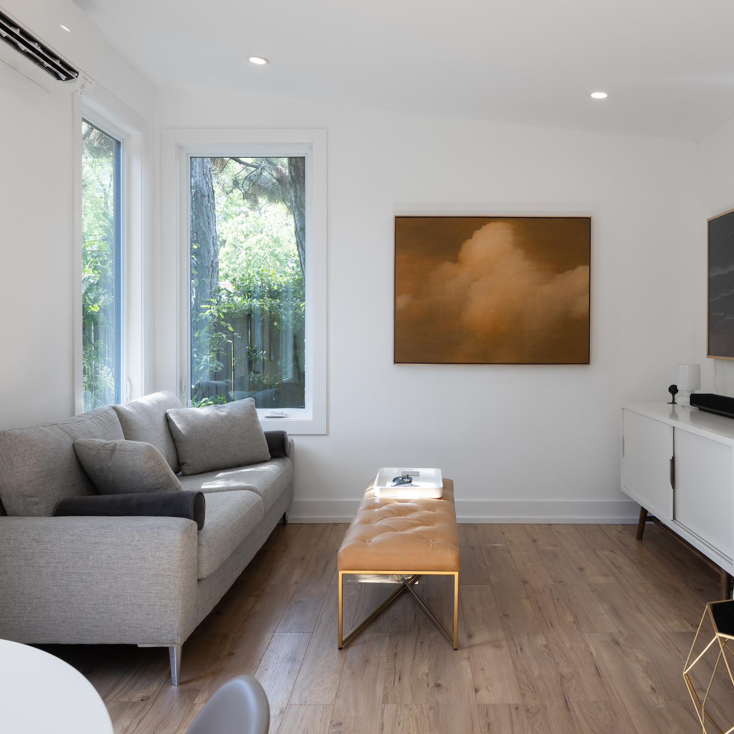 Interior of an insulated 264 sqft cedar backyard studio with climate control and natural light in Toronto, Ontario
