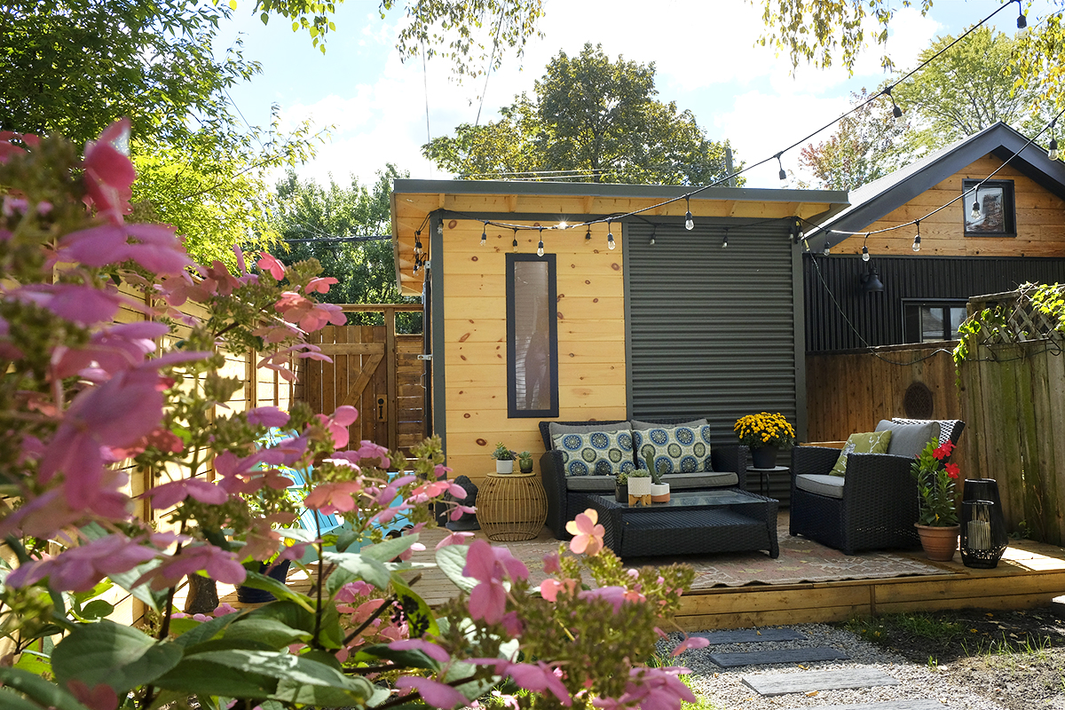 10x10 Garden Shed Essential Shed with graphite grey corrugated steel siding and clear-coat pine front wall in Toronto Ontario installed by Backyard Escape Studios.