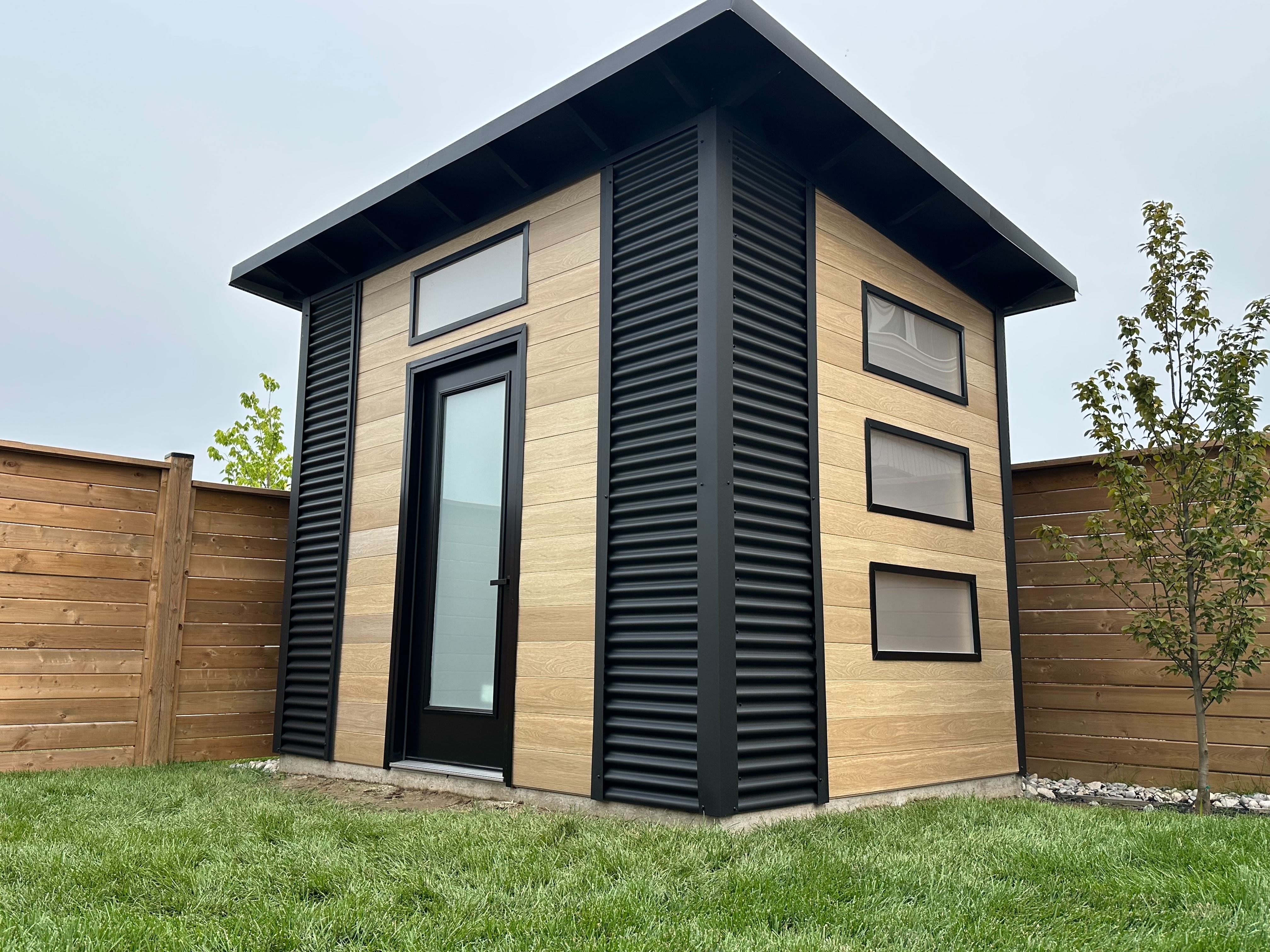 et Black corrugated steel corner detail on an Advanced Shed in St. Thomas Ontario