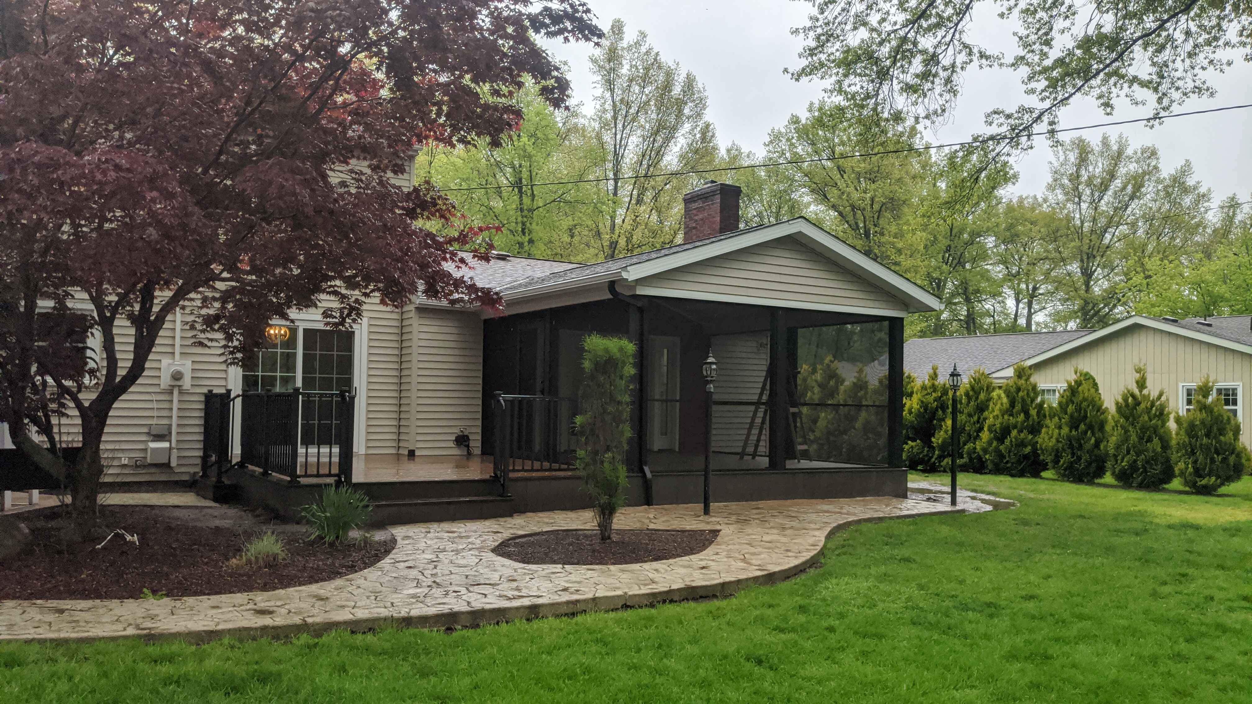 deck building company builds sunroom porch combo