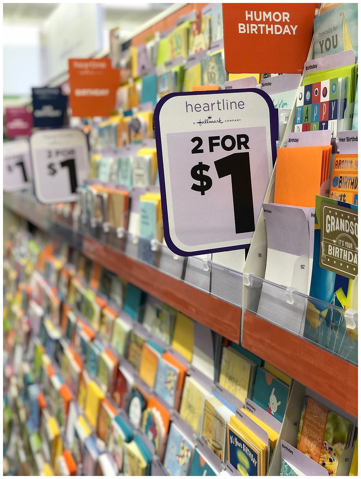 a shelf with cards on it