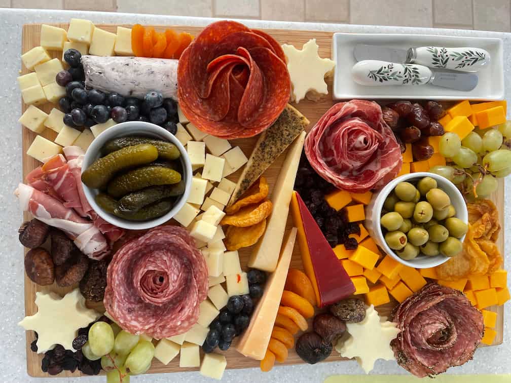 a board with different types of food on it