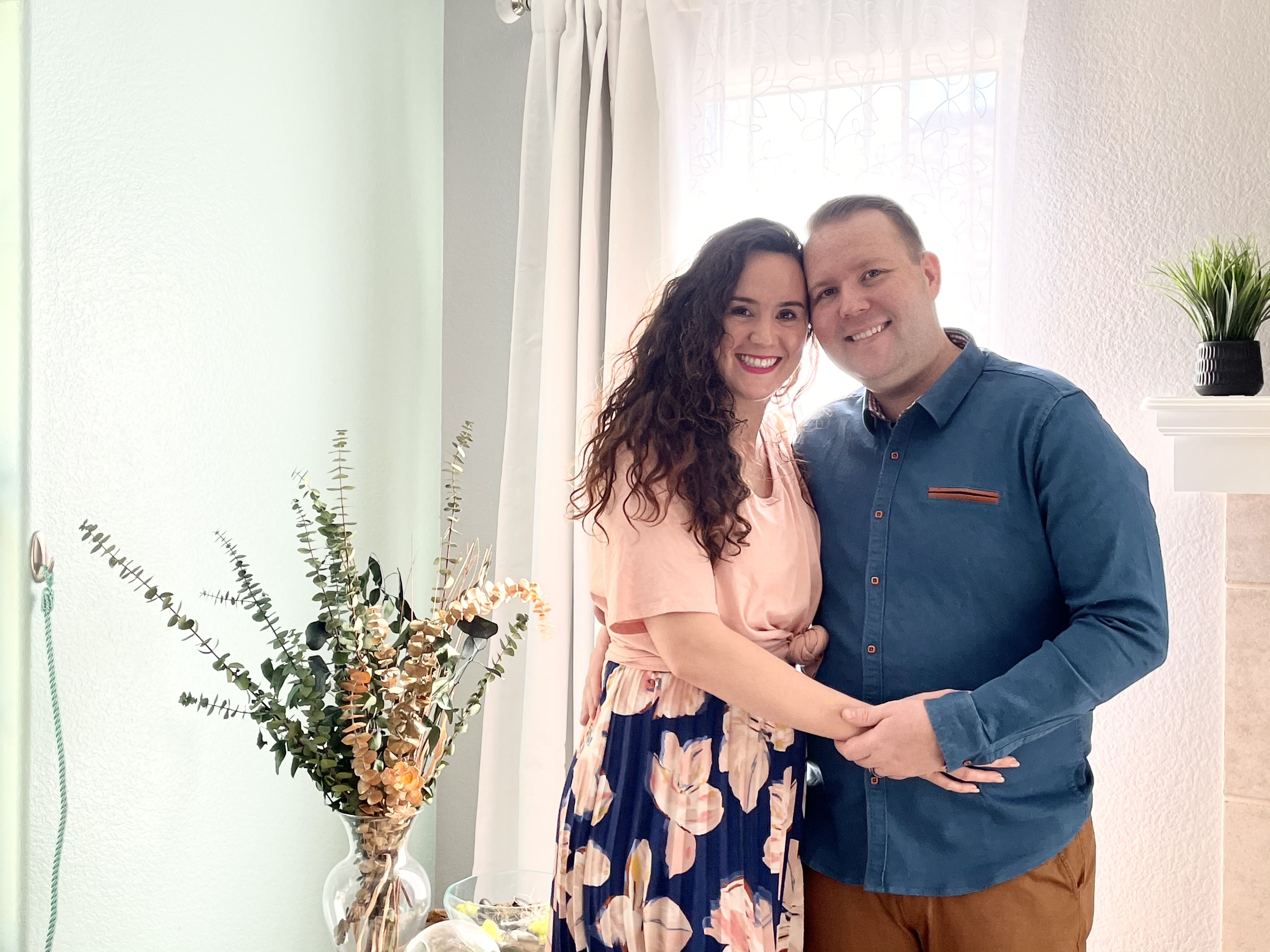 a man and woman posing for a picture