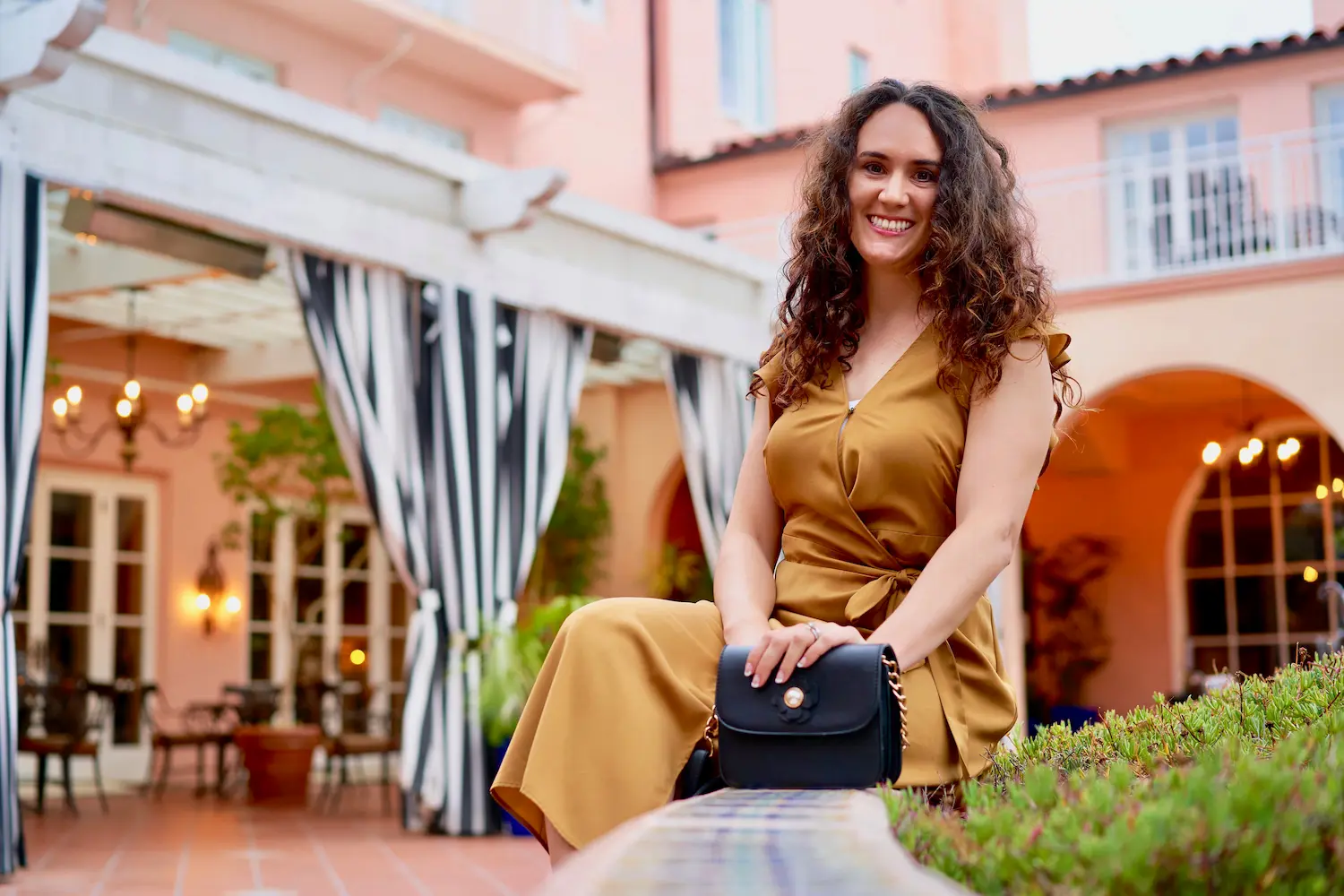 a woman sitting on a bench
