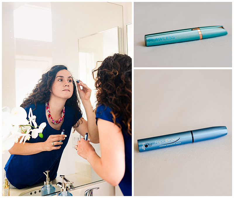 a woman putting on mascara