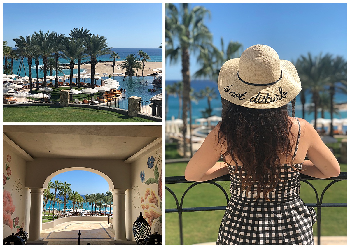 a woman standing on a balcony overlooking a beach